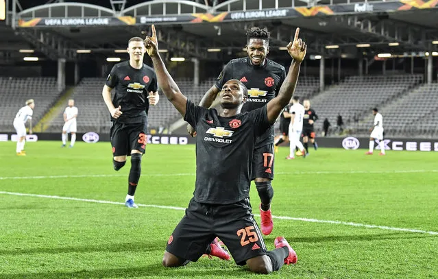 Manchester United's Odion Ighalo celebrates after scoring the opening goal during the Europa League round of 16 first leg soccer match between Linzer ASK and Manchester United in Linz, Austria, Thursday, March 12, 2020. The match is being played in an empty stadium because of the coronavirus outbreak. (Photo by Kerstin Joensson/AP Photo)
