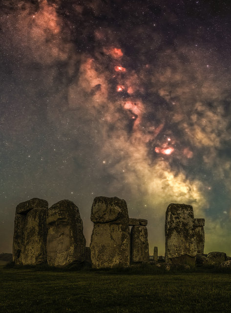 Pictured is the Milky Way core over Stonehenge in Wiltshire on Friday night, May 31, 2024. The image consists of 16 two-minute exposures of the sky using a motorised star tracker, and a single two-minute exposure of the foreground all merged together to reveal more detail than what the naked eye can see. (Photo by Nick Bull/Picture Exclusive)