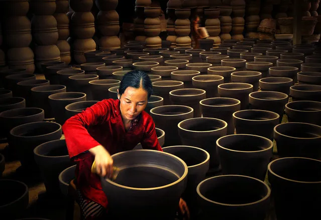 CGAP Photo Contest – Production of Ceramic, Vietnam. This woman was able to establish this small craft workshop through the government's financial assistance. (Photo by Van Bang Vo)