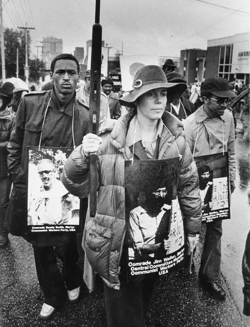 In this November 11, 1979 file photo, Signe Waller leads march in Greensboro, N.C. The state, with the blessing of the Greensboro City Council, will use the word “massacre” for a highway historical marker commemorating the deaths of five Communist Workers Party members during a confrontation with Ku Klux Klansmen and the American Nazi Party. The marker, which will be dedicated Sunday, May 24, 2015. (Photo by Jim Stratford /News & Record via AP Photo)