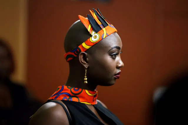 A model waits back stage before participating in a plus size fashion show in Nairobi, Kenya, October 7, 2017. (Photo by Baz Ratner/Reuters)