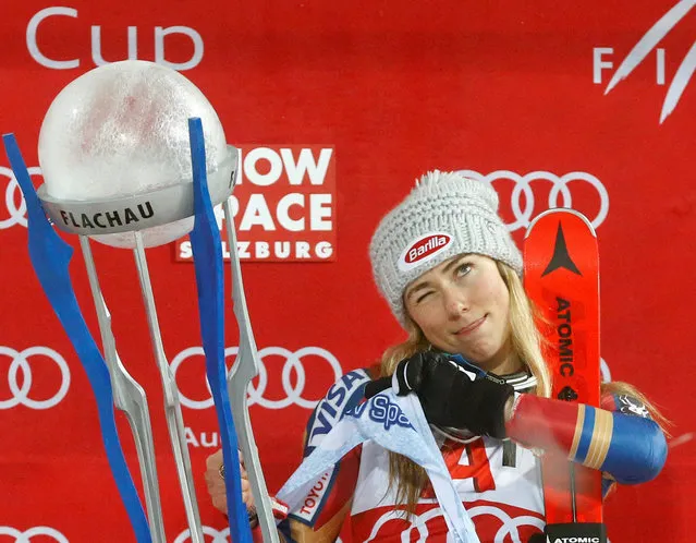 Mikaela Shiffrin of USA celebrates with the trophy winning the FIS World Cup Ladies night Slalom race in Flachau, Austria on January 9, 2018. (Photo by Dominic Ebenbichler/Reuters)