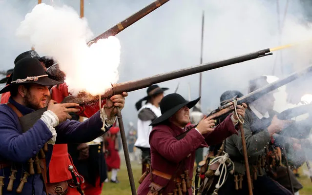 Participants wearing medieval costumes re-enact the 1620 battle of Bila Hora between Bohemian Estates and Austrian Imperial with Catholic forces in Prague, Czech Republic September 18, 2016. (Photo by David W. Cerny/Reuters)