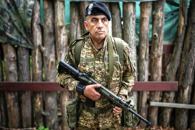 A foreign volunteer of the 13th Operative Purpose Brigade “Khartiia” of the National Guard of Ukraine looks on during a military exercise at a training ground near a front line, amid Russia's attack on Ukraine, in Kharkiv region, Ukraine on June 25, 2025. (Photo by Viacheslav Ratynskyi/Reuters)