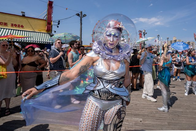 People in a variety of colorful costumes participate in the 43rd annual Mermaid Parade at Coney Island on June 21, 2025 in New York City. The annual Mermaid Parade marks the beginning of summer in NYC and pays tribute to Coney Island’s Mardi Gras celebrations in the early 1900’s. (Photo by Craig T. Fruchtman/Getty Images)