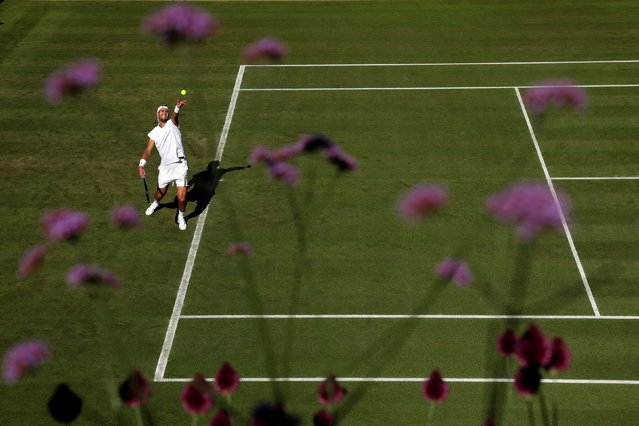 Mackenzie McDonald of United States serves against Karen Khachanov during the Gentlemen's Singles first round match on day one of The Championships Wimbledon 2025 at All England Lawn Tennis and Croquet Club on June 30, 2025 in London, England. (Photo by Ezra Shaw/Getty Images)