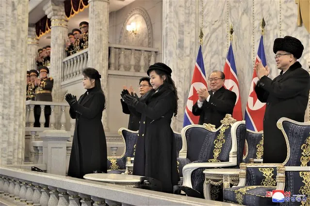 In this photo provided by the North Korean government, daughter of North Korean leader Kim Jong Un, center, and his wife Ri Sol Ju attend a military parade to mark the 75th founding anniversary of the Korean People’s Army on Kim Il Sung Square in Pyongyang, North Korea Wednesday, February 8, 2023. (Photo by Korean Central News Agency/Korea News Service via AP Photo)