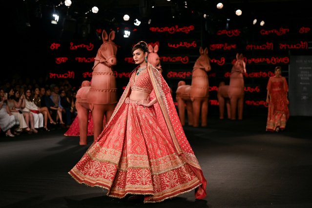 A model presents a creation by designer Ritu Kumar during the India Couture Week in New Delhi on July 27, 2025. (Photo by Sajjad Hussain/AFP Photo)