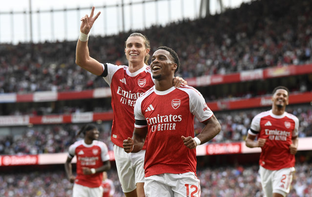 Jurrien Timber of Arsenal celebrates scoring his team's fourth goal with teammate Riccardo Calafiori during the Premier League match between Arsenal and Leeds United at Emirates Stadium on August 23, 2025 in London, England. (Photo by Alan Walter - Arsenal FC/Getty Images)