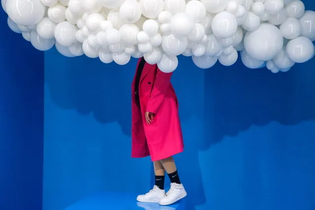 A woman visits the exhibition “Pop Air” at the Balloon Museum in Madrid, Spain, 22 March 2023. The exhibition, dedicated to balloons and inflatable arts, opened to the public in Madrid on 18 March and runs through 23 July 2023. (Photo by Alejandro Lopez/EPA)