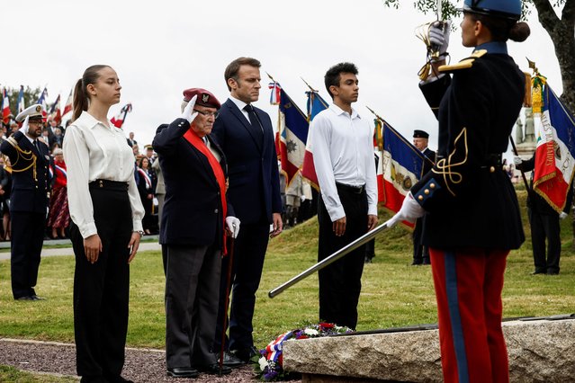 French President Emmanuel Macron and Achille Muller, 98, last survivor of the Free French Forces, attend a ceremony to pay homage to the Saint Marcel maquis, a force of French Resistance fighters during World War II and the French SAS (Special Air Service) paratroopers, in Plumelec, Brittany, on the eve of the 80th anniversary of the 1944 D-Day landings in Normandy, France on June 5, 2024. (Photo by Benoit Tessier/Reuters)