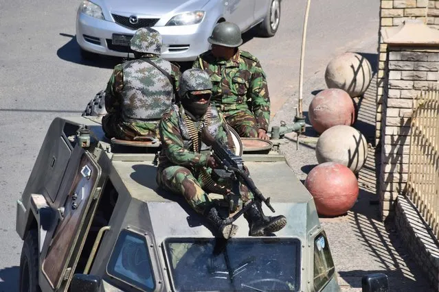 Lesotho Defense Force patrols the town of Maseru on April 18, 2020. Lesotho's embattled prime minister Tom Thabane announced on Saturday he had sent troops onto the streets to “restore order”, accusing unnamed law enforcement agencies of undermining democracy. (Photo by Molise Molise/AFP Photo)