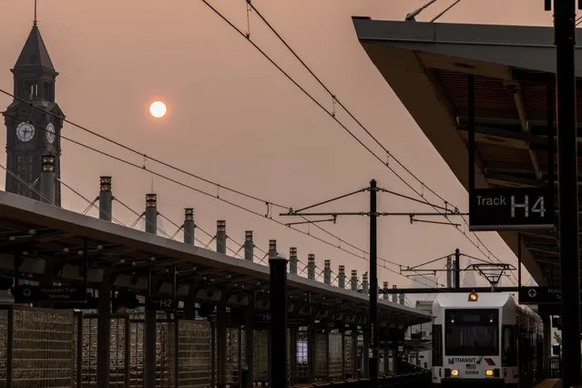 Smoke from Canada wildfires at sunrise in Jersey City, New Jersey, US, on Wednesday, June 7, 2023. New York was the most polluted major city in the world on Tuesday night, as smoke from Canadian wildfires blanketed the city in haze, according to the IQAir website. (Photo by Yuki Iwamura/Bloomberg)