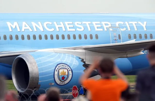 The Boeing 787-9 Dreamliner carrying the Manchester City players lands at Manchester Airport after their victory in the UEFA Champions League final in Istanbul on Sunday, June 11, 2023. (Photo by Tim Goode/PA Images via Getty Images)