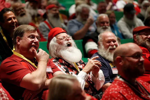 Santas laugh as they learn about Santa Spirit during class at the Charles W. Howard Santa Claus School in Midland, Michigan, U.S. October 27, 2016. (Photo by Christinne Muschi/Reuters)