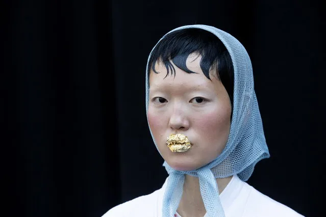 A model is getting ready backstage prior to the Spring/Summer 2019 Women's collections by US designer Thom Browne during the Paris Fashion Week, in Paris, France, 30 September 2018. (Photo by Etienne Laurent/EPA/EFE)