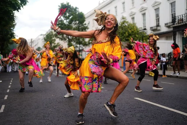 Performers during the children's parade on Family Day on Sunday August 28, 2022 at the Notting Hill Carnival in London, which returned to the streets for the first time on two years, after it was thwarted by the pandemic. (Photo by Victoria Jones/PA Images via Getty Images)
