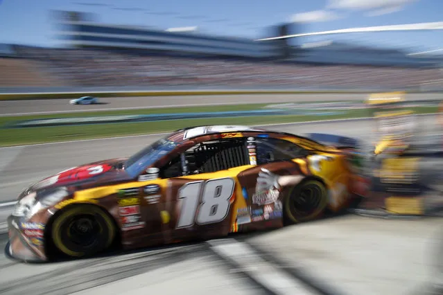 Kyle Busch drives out of his pit during a NASCAR Cup Series auto race at Las Vegas Motor Speedway, Sunday, March 3, 2019, in Las Vegas. (Photo by John Locher/AP Photo)