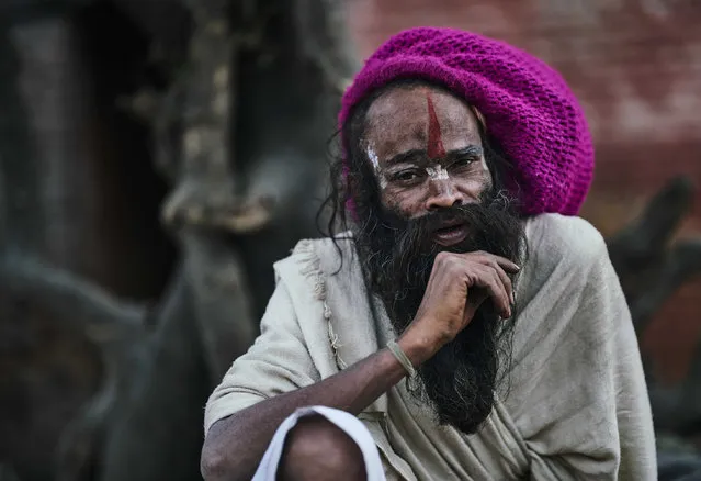 A holy man with a painted face, taken in Kathmandu, Nepal. (Photo by Jan Moeller Hansen/Barcroft Images)