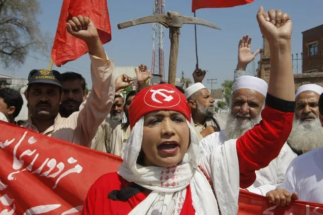 A Pakistani woman shouts slogans at a rally to observe the Labor Day in Peshawar, Pakistan, Friday, May 1, 2015. Pakistan observed International Labor Day with other nations worldwide. (Photo by Mohammad Sajjad/AP Photo)