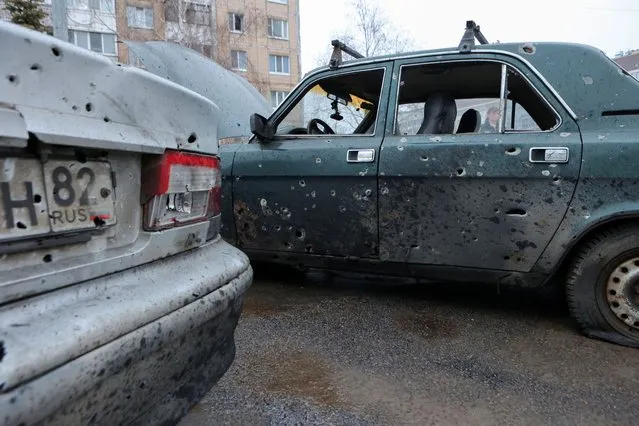 A view shows damaged cars hit by shelling, what local authorities called a Ukrainian military strike, in the course of the Russia-Ukraine conflict in Belgorod, Russia on March 17, 2024. (Photo by Reuters/Stringer)