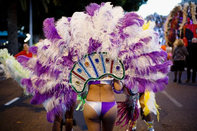 A member of 'Los Brasileiros' walks before performing in the troupes dancing contest during the Santa Cruz de Tenerife Carnival on March 1, 2014 in Santa Cruz de Tenerife on the Canary island of Tenerife, Spain. (Photo by Pablo Blazquez Dominguez/Getty Images)