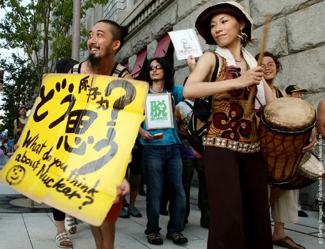 Anti-nuclear activists demonstrate during a Say to Goodbye to Nuclear Energy protest in Kobe, Japan