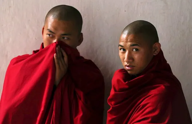 Monks are pictured inside the Punakha Dzong, Bhutan, April 17, 2016. (Photo by Cathal McNaughton/Reuters)