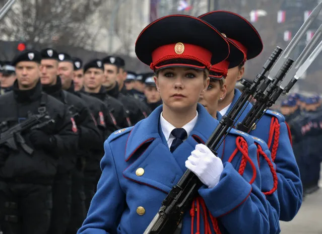 Members of the police forces of Republic of Srpska march during a parade marking the 30th anniversary of the Republic of Srpska in Banja Luka, northern Bosnia, Sunday, January 9, 2022. This week Bosnian Serb political leader Milorad Dodik was slapped with new U.S. sanctions for alleged corruption. Dodik maintains the West is punishing him for championing the rights of ethnic Serbs in Bosnia – a dysfunctional country of 3.3 million that's never truly recovered from a fratricidal war in the 1990s that became a byname for ethnic cleansing and genocide. (Photo by Radivoje Pavicic/AP Photo)