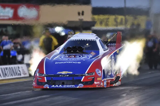 In this photo provided by the NHRA, defending event winner Robert Hight drives in Funny Car qualifying at the NHRA Sonoma Nationals drag races on Friday, July 26, 2019, in Sonoma, Calif. (Photo by Richard Wong/NHRA via AP Photo)