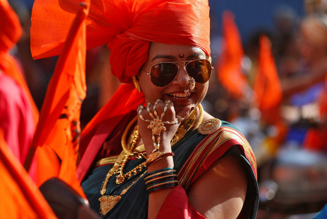 A woman dressed in traditional costume attends celebrations to mark the Gudi Padwa festival, the beginning of the New Year for Maharashtrians, in Mumbai, India March 28, 2017. (Photo by Shailesh Andrade/Reuters)