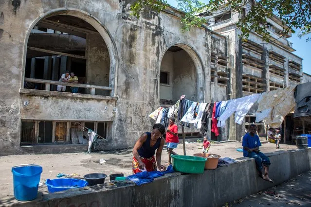 The Olympic-sized swimming pools are now being used to do washing. (Photo by Fellipe Abreu/The Guardian)