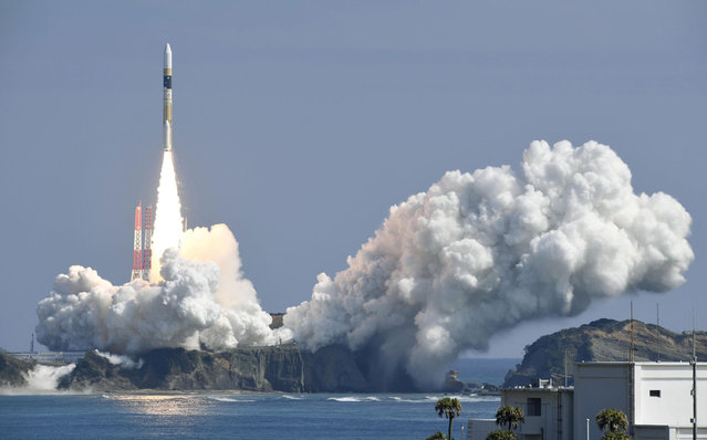 A H-IIA rocket, carrying a government's information gathering radar satellite, lifts off from the launching pad at Tanegashima Space Center on the Japanese southwestern island of Tanegashima, Japan, in this photo taken by Kyodo March 17, 2017. (Photo by Reuters/Kyodo News)
