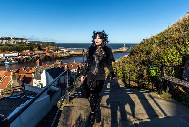 A woman attends the Whitby Goth Weekend in Whitby, Yorkshire on October 27, 2019, as hundreds of goths descend on the seaside town where Bram Stoker found inspiration for “Dracula” after staying in the town in 1890. (Photo by Danny Lawson/PA Images via Getty Images)