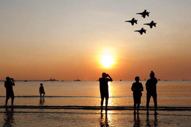 This handout photo taken on July 18, 2024 and released on July 19 by the Australian Defence Force shows two Royal Australian Air Force (RAAF) EA-18G Growlers and two F/A-18F Super Hornet aircraft flying in formation during the Mindil Beach Flying Display in Darwin during Exercise Pitch Black 24. Exercise Pitch Black 24 is the Royal Australian Air Force’s biennial international engagement exercise with 20 participating nations and over 140 aircraft involved, and approximately 4,400 personnel from Australia and overseas participating. (Photo by Lac Kurt Lewis/Australian Defence Force/AFP Photo)