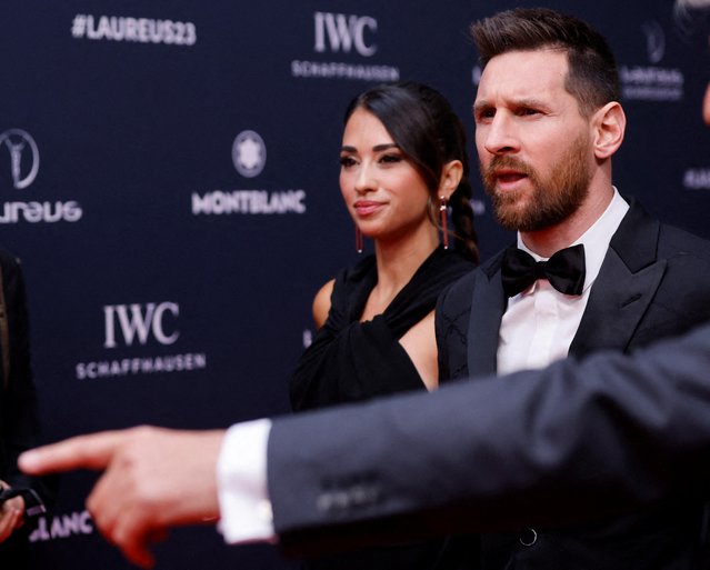 Laureus World Sportsman of the Year nominee Argentinian football player Lionel Messi (R) and his wife Antonela Roccuzzo pose on the red carpet prior to the 2023 Laureus World Sports Awards ceremony in Paris on May 8, 2023. (Photo by Johanna Geron/Reuters)