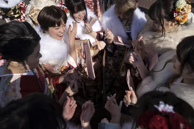 Women wearing kimonos attend a Coming of Age ceremony at the Toshimaen amusement park on January 13, 2020 in Tokyo, Japan. (Photo by Tomohiro Ohsumi/Getty Images)
