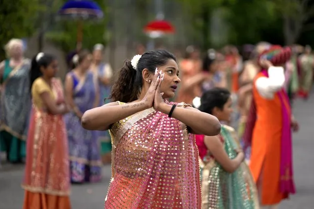 Performers take part in a rehearsal for the Nutkhut creative company ahead of their upcoming Bollywood style performance entitled “The Wedding Party”, which will be part of the procession at the Platinum Jubilee Pageant, at Northolt High School, in north west London, Sunday, May 29, 2022. Celebrations will take place June 2-5 to mark Queen Elizabeth II's Platinum Jubilee, for her 70 years on the throne. (Photo by Matt Dunham/AP Photo)