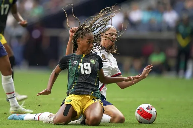 Jamaica's Tiernny Wiltshire (19) and United States' Sophia Smith fight for the ball during a CONCACAF Women's Championship soccer match in Monterrey, Mexico, Thursday, July 7, 2022. (Photo by Fernando Llano/AP Photo)