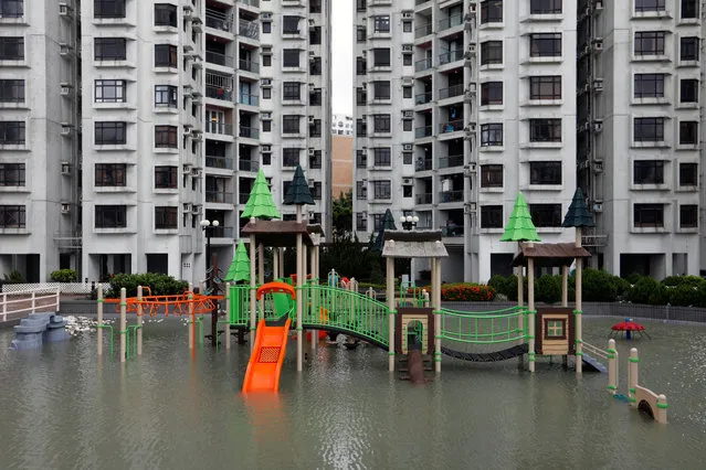 A flooded playground is seen after Typhoon Hato hits Hong Kong, China on August 23, 2017. (Photo by Tyrone Siu/Reuters)