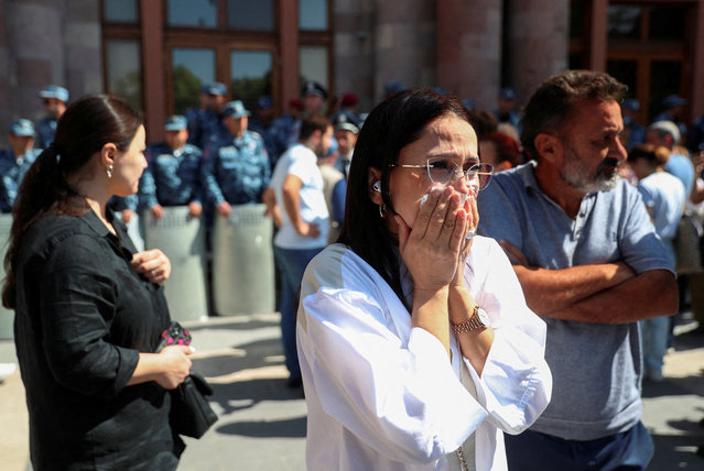 Protesters gather near the government building following the launch of a military operation by Azerbaijani forces in the region of Nagorno-Karabakh, in Yerevan, Armenia on September 20, 2023. (Photo by Irakli Gedenidze/Reuters)