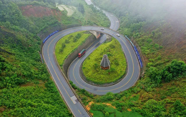 Aerial view of a winding road in mountain area on June 3, 2020 in Rongjiang County, Guizhou Province of China. (Photo by VCG/VCG via Getty Images)