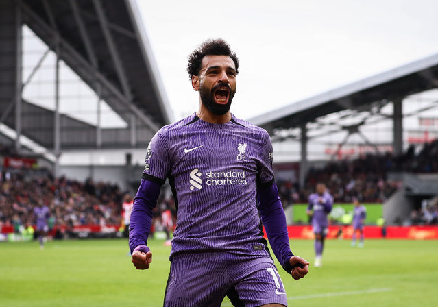 Mohamed Salah of Liverpool celebrates after scoring his team's third goal during the Premier League match between Brentford FC and Liverpool FC at Gtech Community Stadium on February 17, 2024 in Brentford, England. (Photo by Ryan Pierse/Getty Images)