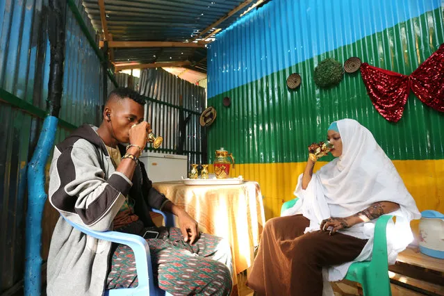 The newly married Somali couple Mohamed Noor and Hoda Omar are seen inside their home in Mogadishu's Rajo camp, Somalia August 18, 2016. (Photo by Feisal Omar/Reuters)