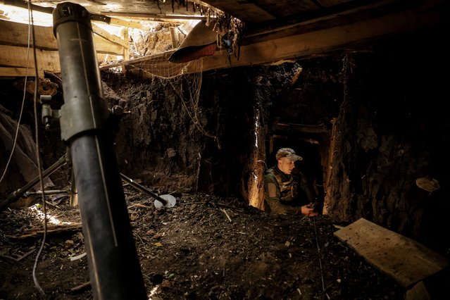 A Ukrainian serviceman prepares to fire a 120-mm mortar towards Russian troops at a frontline, amid Russia's attack on Ukraine, near the town of Chasiv Yar in Donetsk region, Ukraine on May 29, 2025. (Photo by Ukrainian Armed Forces/Reuters)