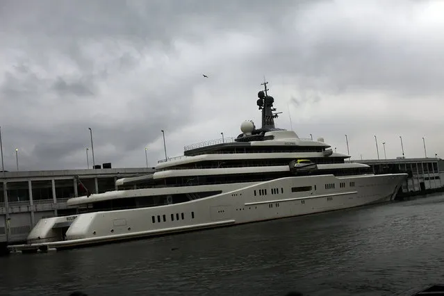 The Eclipse, reported to be the largest private yacht in the world, is viewed docked at a pier in New York on February 19, 2013 in New York City. The boat, which measures 557ft in length and is estimated to cost 1.5 billion US dollars, is owned by Russian billionaire Roman Abramovich and arrived into New York on Wednesday.  (Photo by Spencer Platt)