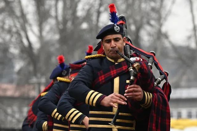 An Indian police band performs during a Republic Day parade at a stadium in Srinagar on January 26, 2023. (Photo by Tauseef Mustafa/AFP Photo)