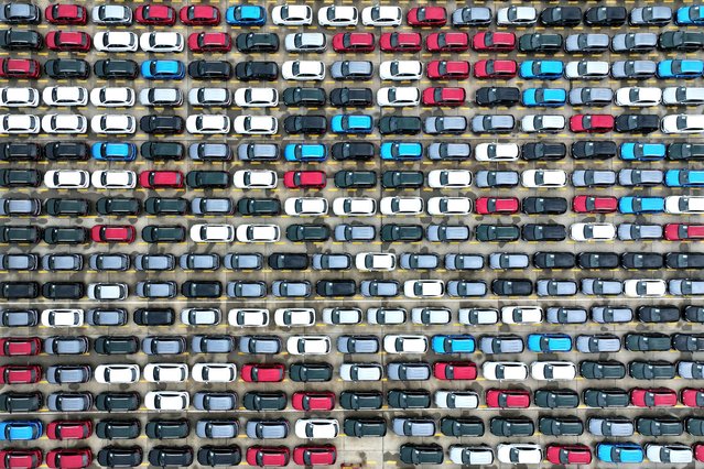 Chinese-made cars are seen before being loaded onto a ship at the port in Lianyungang, in China's eastern Jiangsu province on June 20, 2025. (Photo by AFP Photo/China Stringer Network)