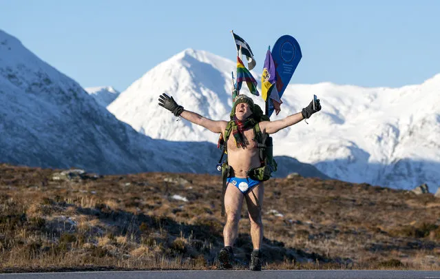 Mick Cullen, otherwise known as Speedo Mick, walks through Glencoe, Scotland in sub-zero temperatures wearing only his swimming trunks on Friday, January 20, 2023. Mick is walking 1,000 miles from John O'Groats to Land's End whilst also completing the Three-Peak Challenge to scale Ben Nevis, Scafell Pike and Mount Snowdon along the way. (Photo by Jane Barlow/PA Wire Press Association)