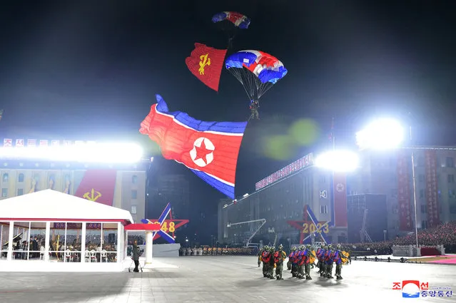 Paratroopers perform during a military parade to mark the 75th founding anniversary of North Korea's army, at Kim Il Sung Square in Pyongyang, North Korea February 8, 2023, in this photo released by North Korea's Korean Central News Agency (KCNA). (Photo by KCNA via Reuters)
